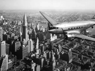 ANONYMOUS - DC-4 over Manhattan, NYC