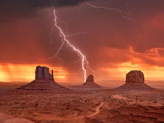 PANGEA IMAGES - Storm on Monument Valley, Utah
