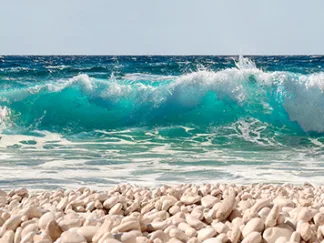 PANGEA IMAGES - Wave on Pebbles Beach